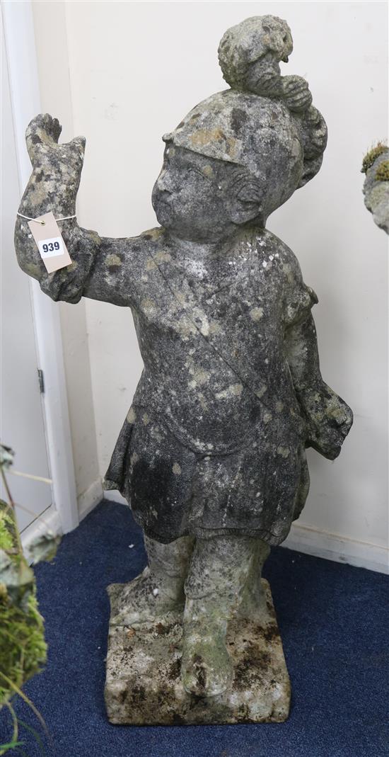 A pair of weathered composition garden statues modelled as putti dressed as Roman soldiers, H.3ft 2in.